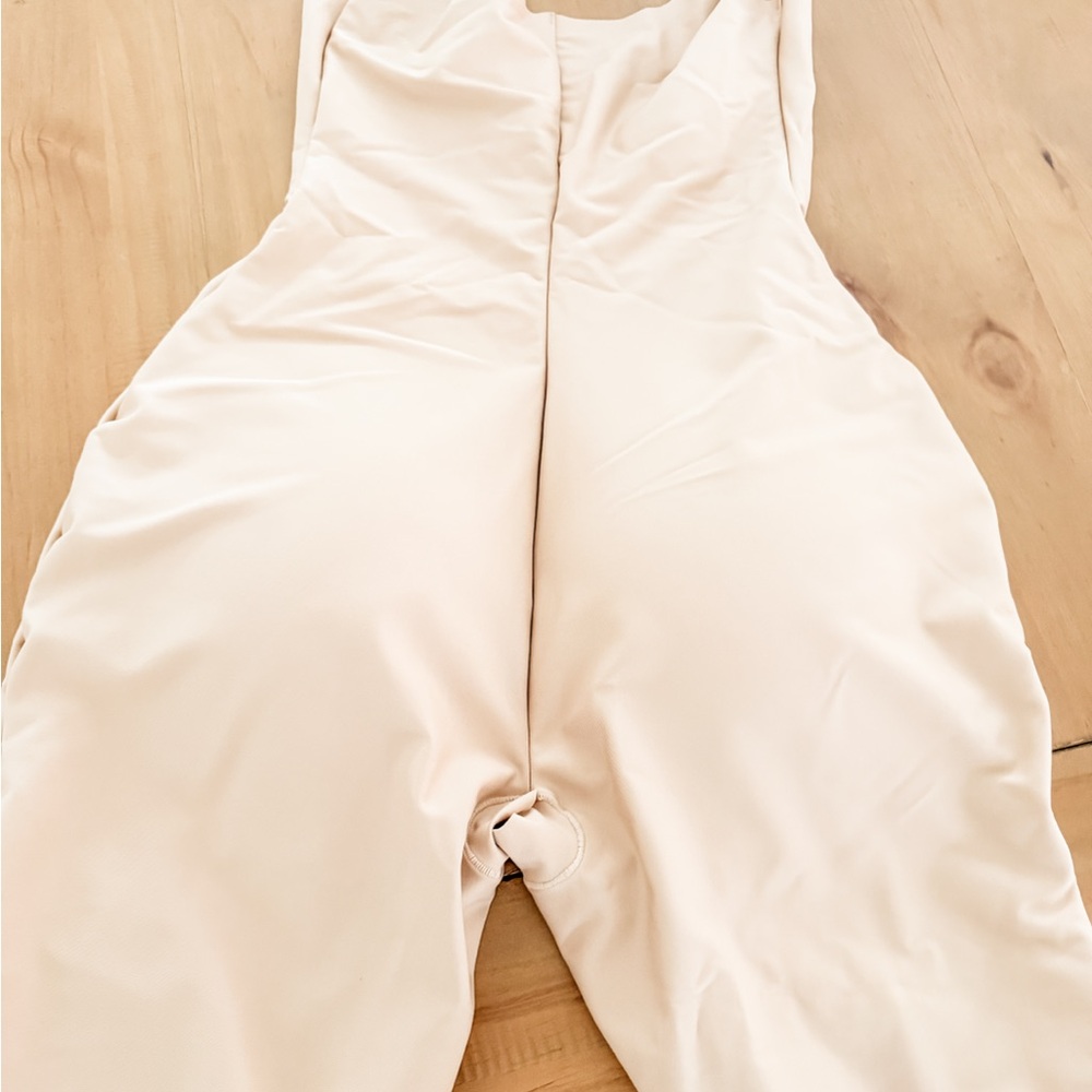 SKIMS CLAY Butt lifting open bust bodysuit
